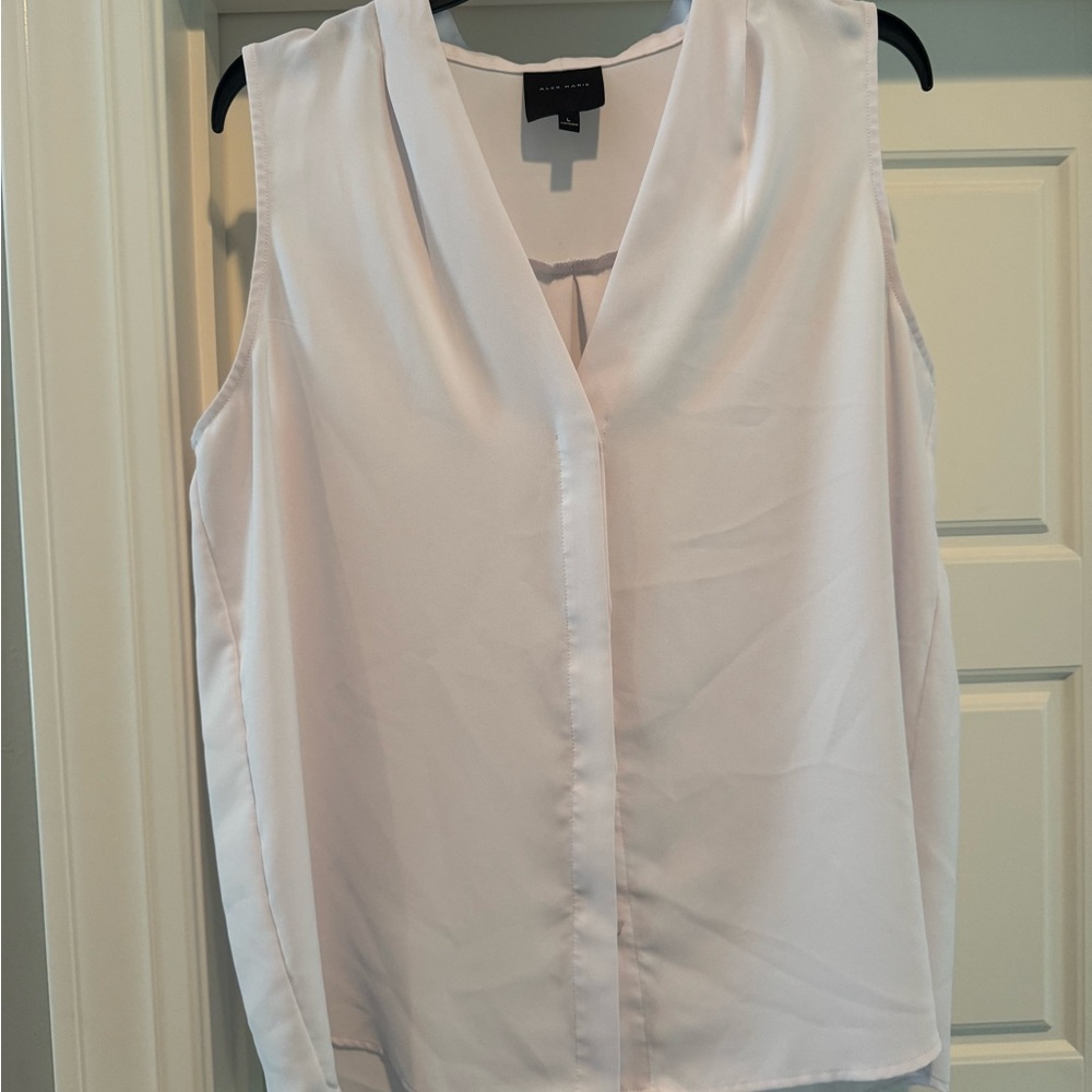 Ann Taylor Sleeveless V-Neck Top in white with a pink hue